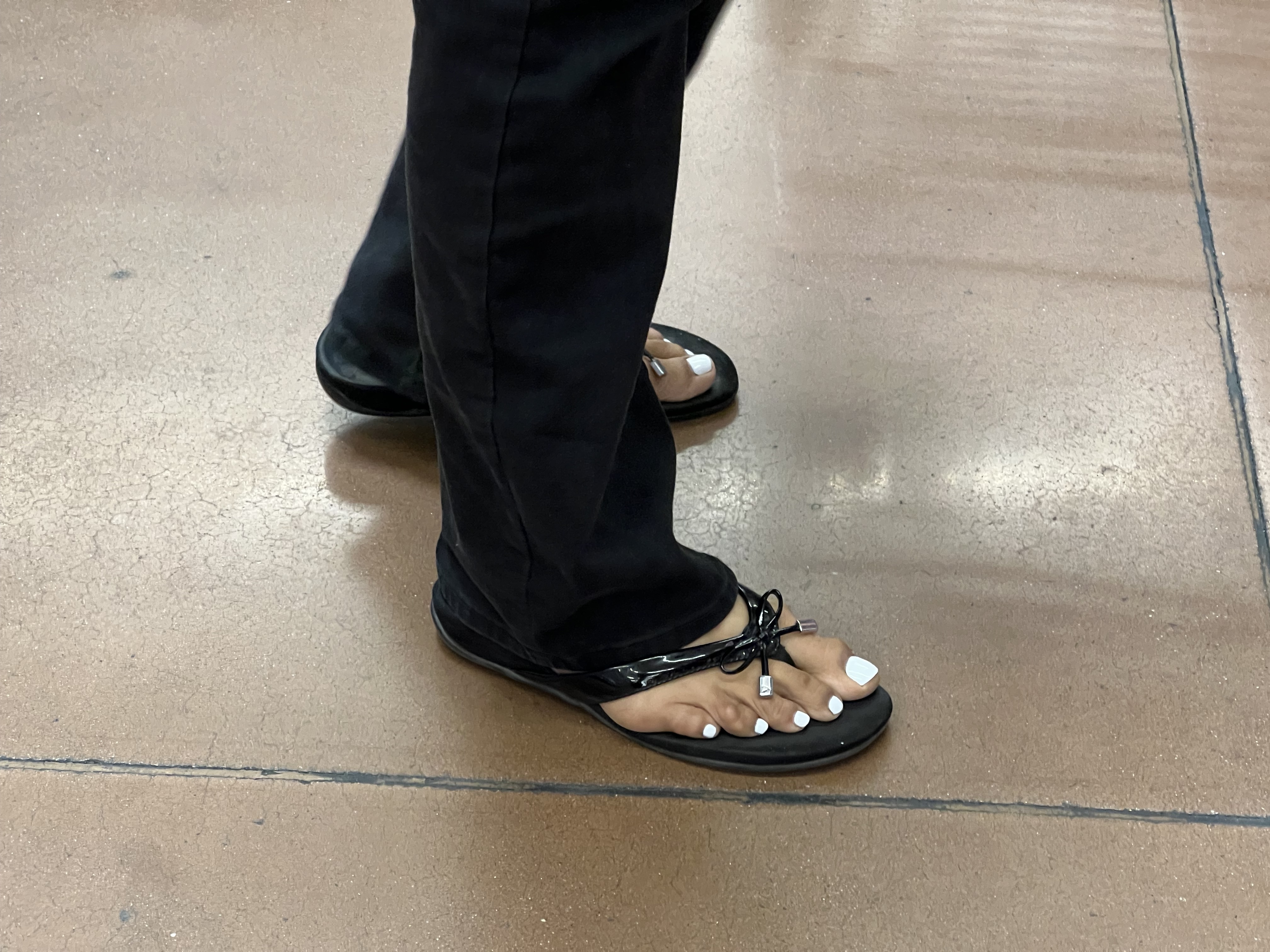 Gilf and milf feet at supermarket — 5